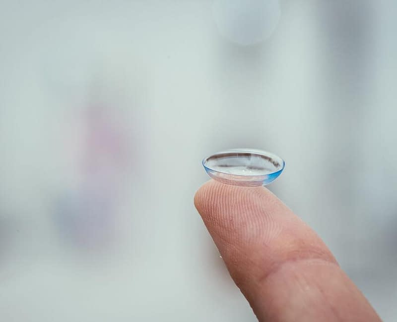 kids contact lenses, contact lens on finger